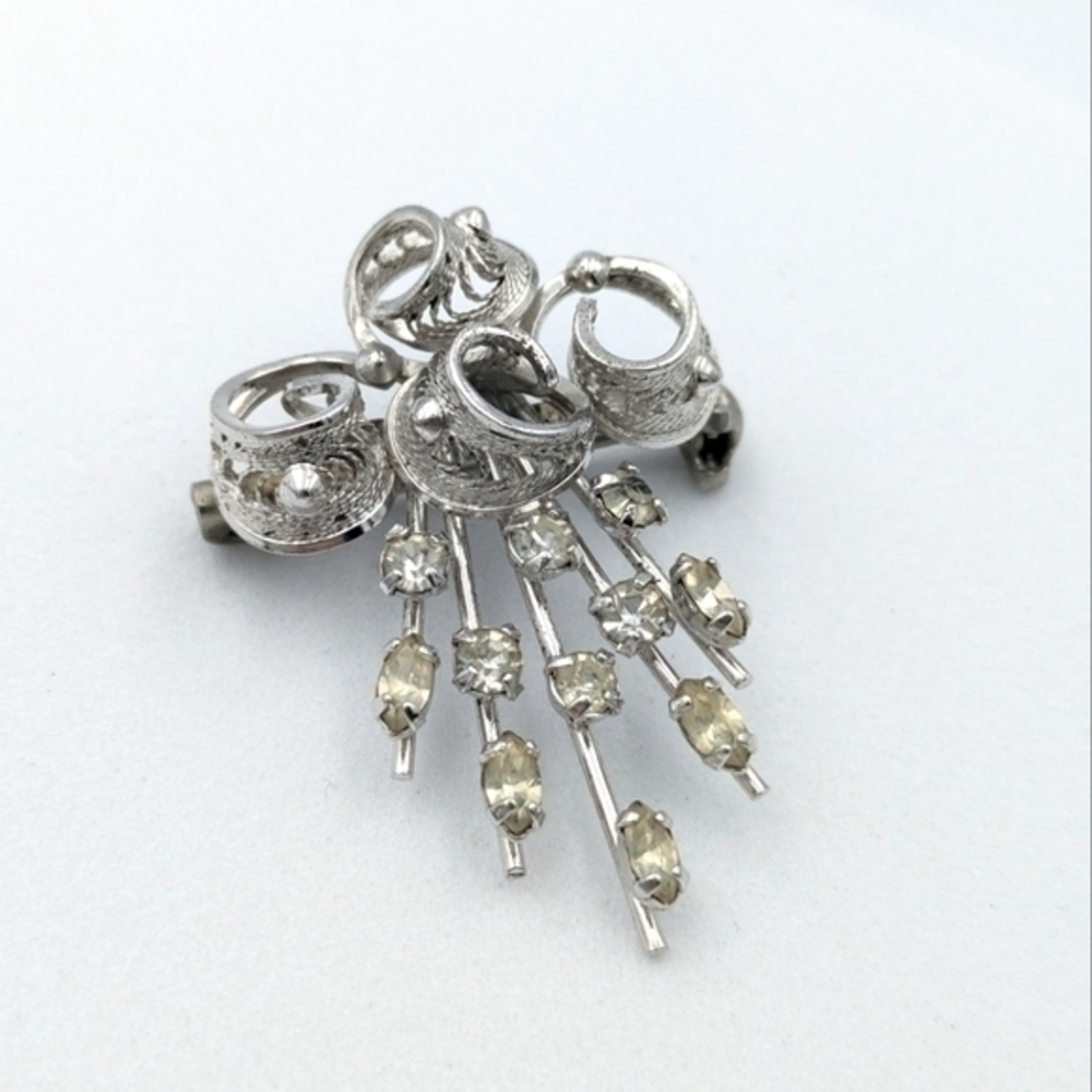 Vintage silver tone filigree and rhinestone brooch pin